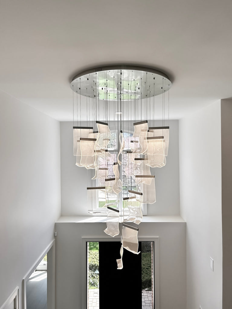 Sterling Custom Homes and Renovations features Jade Connor Design Diaphanous Chandelier