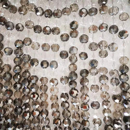 Lámpara de pared con cuentas de cristal